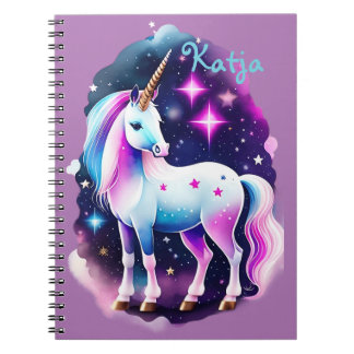 süßes Einhorn vor einem funkelnden Sternenhimmel Notizblock