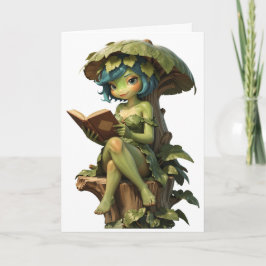 Süßes Froschmädchen liest Buch unter einem Blatt Karte