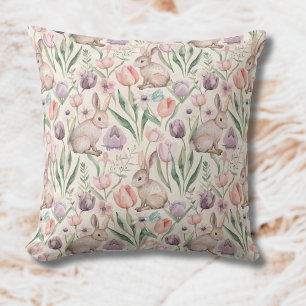 Süßes graues Kaninchen mit bunten Tulpen Kissen