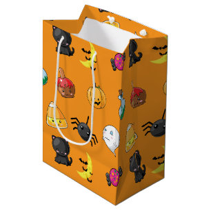 Süßes Halloween-Muster mit orangefarbenem Hintergr Mittlere Geschenktüte