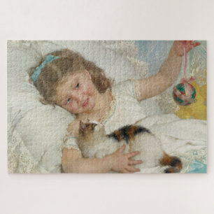 Süßes junges Mädchen beim Spielen mit ihrer Hauska Puzzle