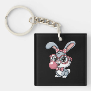 Süßes Kaninchen mit Brille, das Bubble Gum bläst Schlüsselanhänger