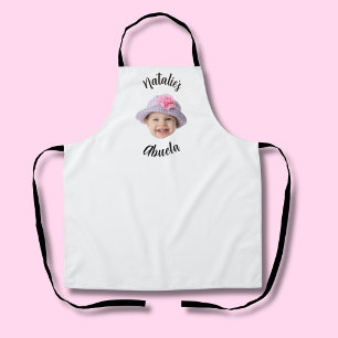Süßes Kinderbaby-Gesicht Foto Kind Name Abuela Schürze