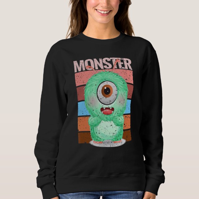 Süßes Monster in grüner Kruste mit einem riesigen  Sweatshirt (Vorderseite)