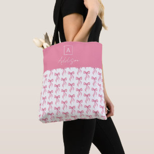 Süßes, personalisiertes Monogramm mit rosa Schleif