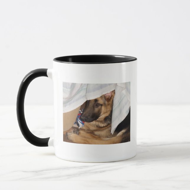Süßes Quent spielt flüchtigen Blick Tasse (Links)