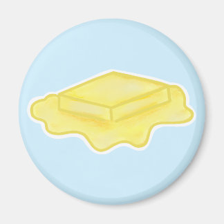 Süßes schmelzendes Butterstück auf Blau Magnet