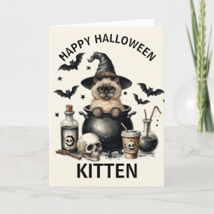 Süßes Vintage-Kätzchen in einem Halloween-Kessel Feiertagskarte