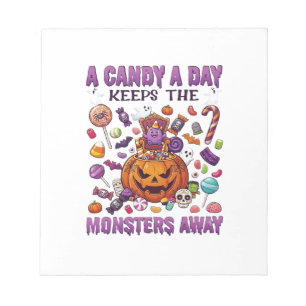 Süßigkeiten-Tag hält Monster Halloween-Kürbis fern Notizblock