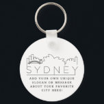 Sydney | Stylisierte Skyline Custom Slogan Schlüsselanhänger<br><div class="desc">Eine einzigartige Schlüsselkette,  die die schöne und einladende Stadt Sydney,  Australien,  repräsentiert. Dieser Schlüsselanhänger zeigt die einzigartige Skyline der Stadt mit ihrem Namen darunter. Unter dem Namen der Stadt finden Sie einen Platz für Ihren einzigartigen Slogan oder Ihre Aussage über Ihre Lieblingsstadt.</div>