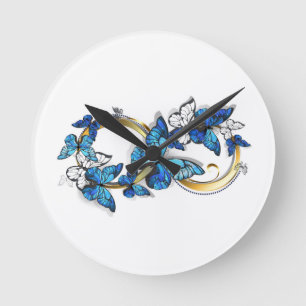 Symbol Unendlichkeit von blauen Morpho-Schmetterli Runde Wanduhr