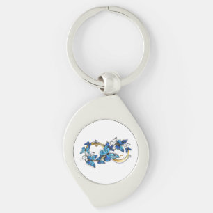 Symbol Unendlichkeit von blauen Morpho-Schmetterli Schlüsselanhänger
