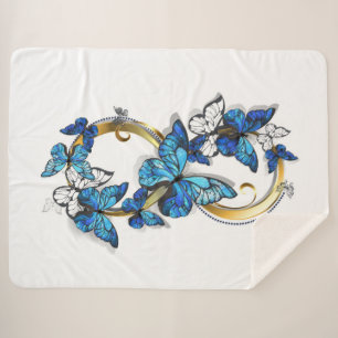 Symbol Unendlichkeit von blauen Morpho-Schmetterli Sherpadecke