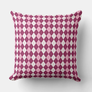 Symmetrisches rosa und weißes Argyle-Design Kissen