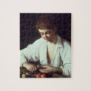 T31971 ein junger Junge, der Apple abzieht Puzzle