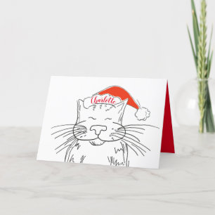 Tabby Cat in roter Weihnachtsmannmütze Weihnachten