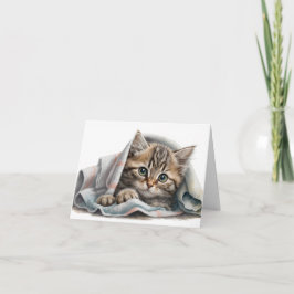 Tabby Kitten unter der Decke
