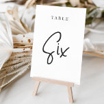 Tabelle SIX mit der Hand schwarz und weiß Tischnummer<br><div class="desc">Einfache und schicke Tischnummer-Karten in Schwarz und Weiß machen bei Ihrer Hochzeit oder Veranstaltung ein elegantes Statement. Das Design bietet "table [number]" in einem spannenden Mix aus klassischen Serifen und handgeschriebenen Skripten. Design wiederholt sich auf beiden Seiten. Einzelne nummerierte Karten werden separat verkauft; bestellen Sie jede Tischnummer einzeln aus unserer...</div>