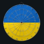 Tafel mit der Flagge der Ukraine Dartscheibe<br><div class="desc">Fügen Sie Ihrem Spielzimmer eine Touch ukrainischen Stolzes mit unserem exklusiven Dartboard mit der Flagge der Ukraine hinzu! Dieses mit viel Liebe zum Detail entworfene Dartboard ist mehr als nur ein funktionaler Gegenstand, es ist ein Feiern des kulturellen und kulturellen Stolzes der Ukraine. Das lebendige Design zeigt die berühmte ukrainische...</div>