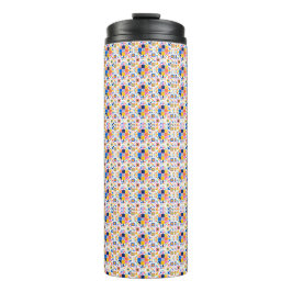 Tall travel mug with a vibrant, geometric pattern  thermosbecher