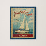 Tampa Sailboat Vintage Travel Florida Puzzle<br><div class="desc">Diese Grüße aus Tampa Florida Vintage Reise nautische Design verfügt über ein Boot auf dem Wasser segeln mit Möwen und einen blauen Himmel gefüllt mit prächtigen puffigen weißen Wolken.</div>