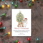 Tan Corgi und Weihnachtsbaum Haustier Hund Feiertagskarte<br><div class="desc">Diese bezaubernde Weihnachtskarte mit Corgi-Motiven ist mit einem bräunlichen und weißen Korgi ausgestattet, der eine Weihnachtsmannmütze trägt, die vor einem beleuchteten Weihnachtsbaum sitzt. Der Gruß auf der Karte lautet "Frohe Weihnachten" "Möge alles, was schön ist und Ihnen Freude bringt, sein diese Feriensaison und das ganze Jahr lang" und kann personalisiert...</div>