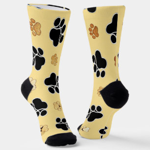 Tan und schwarze Pfoten auf goldenem Hintergrund Socken