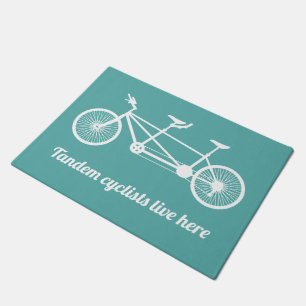 Tandem-Radfahrer leben hier Aquamarin blau und wei Fußmatte