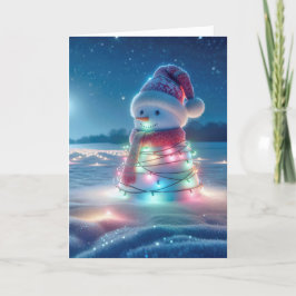 Tangierte Weihnachtsleuchten auf einem Schneemann Feiertagskarte