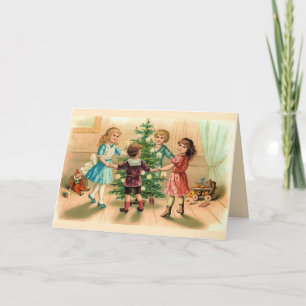 Tanzen um den Weihnachtsbaum Feiertagskarte