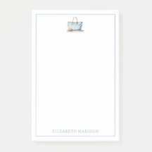 Tasche am Strand zwischen blau und weiß Streifen