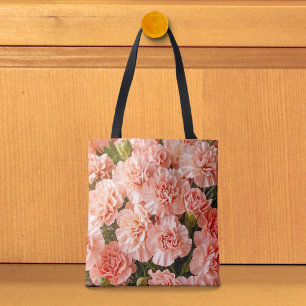 Tasche mit blassen rosa Nelken
