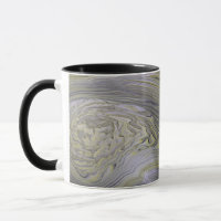 Tasse aus flüssigem Gold