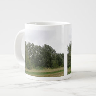 Tasse der ansteigenden Bäume Landschaft