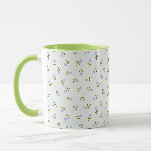 Tasse der Babyknospen mit farbenfroher Handgriff (Links)