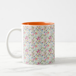 Tasse der Blumenkunst, lebendiges Muster der Blume
