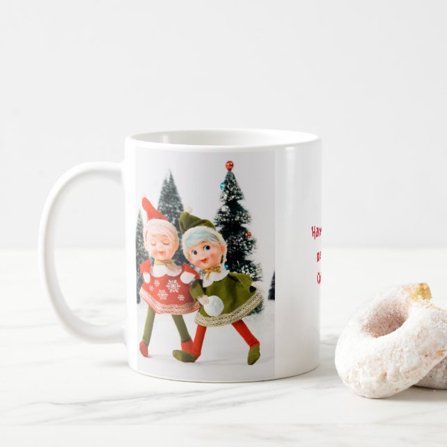 Tasse des Kaffees, frohe Weihnachtself (Mit Donut)