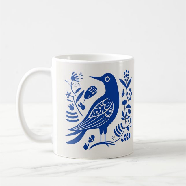 Tasse des skandinavischen Volksvogelkaffees (Links)