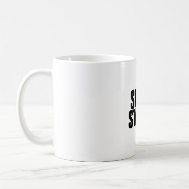 Tasse des starken Faust-Symbols bleibe (Links)