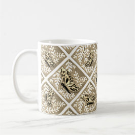 Tasse mit Blattwerk und Schmetterlingen
