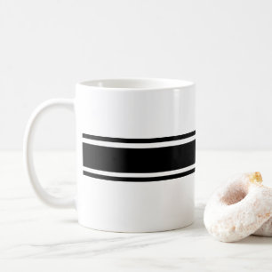 Tasse mit schwarzen Streifen