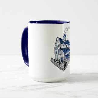 Tasse mit zeichn eines Skizzenhauses mit blauem Da