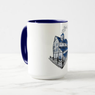 Tasse mit Zeichnung eines skizzenhaften Hauses mit