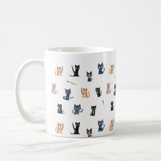 Tasse von Katzen und Messern
