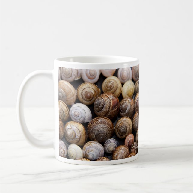 Tasse von SchneckenMuscheln (Links)