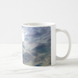 Tasse von Sonne und Wolken