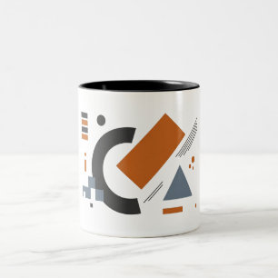 Tassen mit kreativer geometrischer Kunst