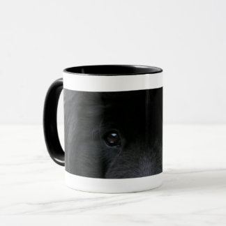 Taza de café con ojos de perro negro tasse