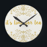 Tea Time Runde Wanduhr<br><div class="desc">Diese elegante und dennoch einfache Uhr wird Ihnen immer sagen, wie spät es wirklich ist! Das ist ein tolles Geschenk für jeden, der eine gute Tasse Tee genießt oder ein Teeshop besitzt. Bestellen ist sicher, einfach, schnell und unterhaltsam. Wie wir: facebook.com/ShopJandL Vergewissern Sie sich, alle unsere Geschäfte auf Zazzle zu...</div>