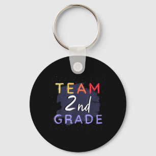 Team 2. Klasse _ Farbenfrohe Studentenlehrerin zur Schlüsselanhänger